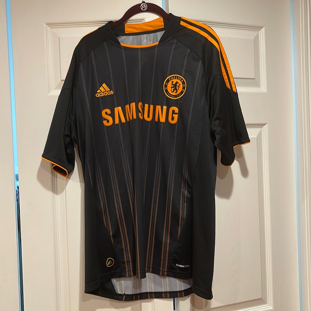 Chelsea Football Club black and orange jersey. Size L.